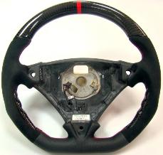 Porsche_Cayenne_sport_carbon_alcantara_steering_wheel-229x218.jpg